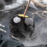 Close-up of a black candy apple.