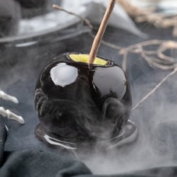 Close-up of a black candy apple.