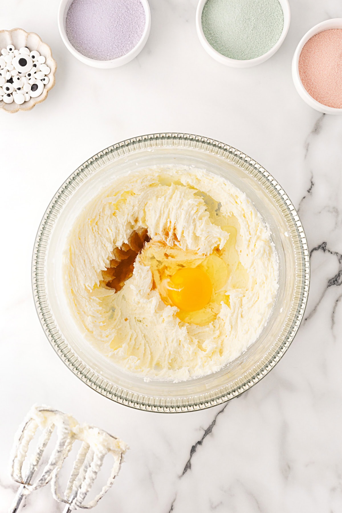 Adding eggs and vanilla. 