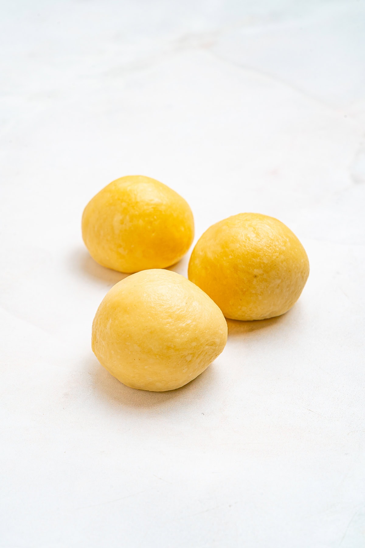 Kneaded balls of dough.