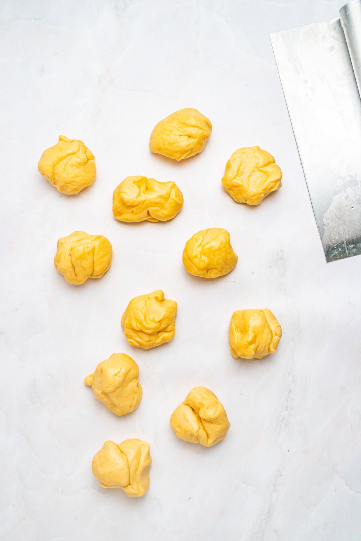 Dough divided into 12 pieces.