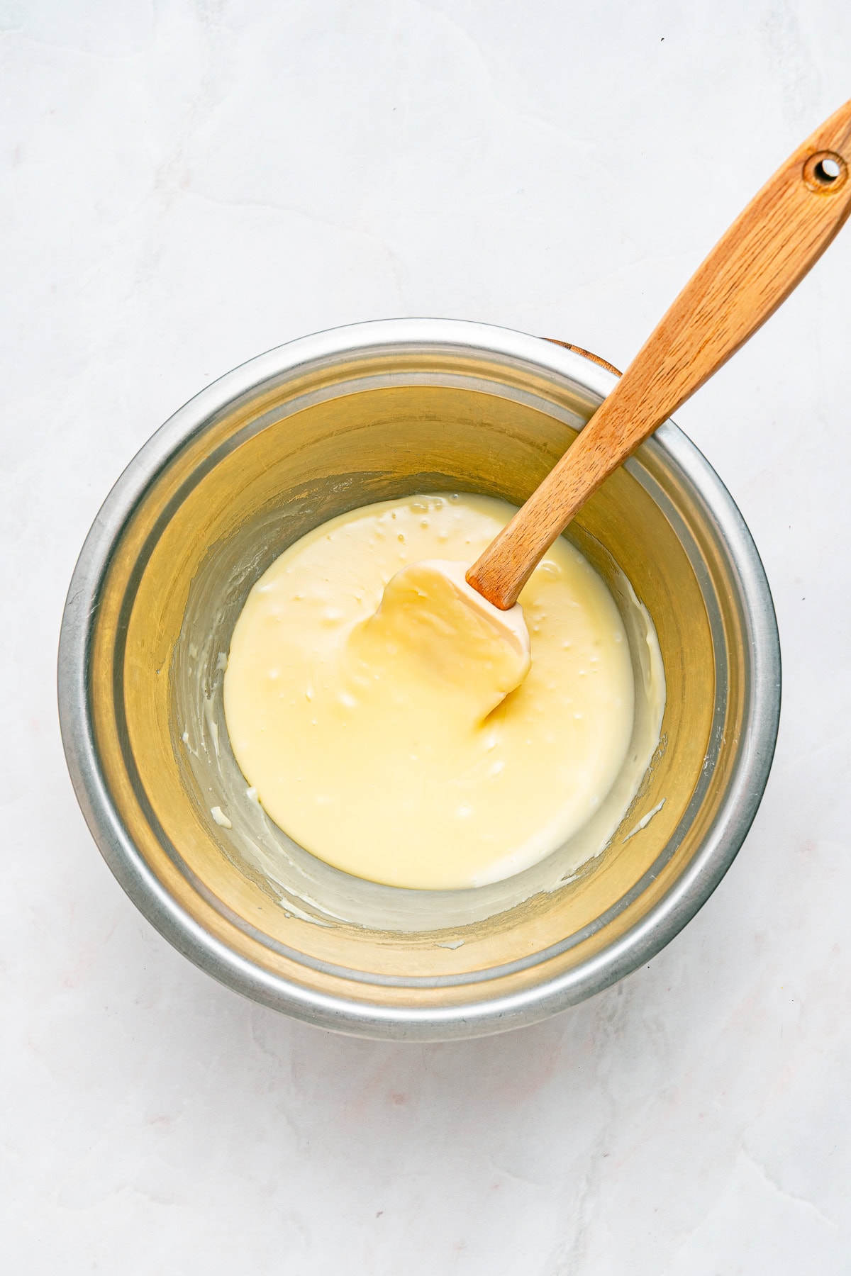 Melted white chocolate and sweet condensed milk.